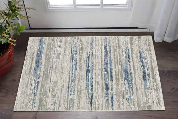 HomeRoots 2' Abstract Power Loom Runner Rug in Grey Blue, Light Blue, Ivory & Brown - Stain Resistant Style 3' x 5' 508779