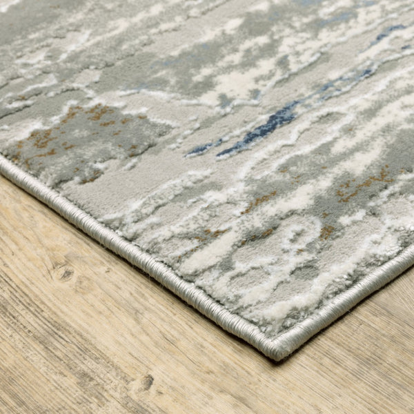 HomeRoots 2' Abstract Power Loom Runner Rug in Grey Blue, Light Blue, Ivory & Brown - Stain Resistant Style 3' x 5' 508779