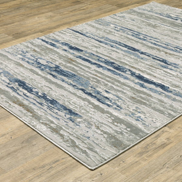 HomeRoots 2' Abstract Power Loom Runner Rug in Grey Blue, Light Blue, Ivory & Brown - Stain Resistant Style 3' x 5' 508779