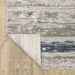 HomeRoots 2' Abstract Power Loom Runner Rug in Grey Blue, Light Blue, Ivory & Brown - Stain Resistant Style 3' x 5' 508779