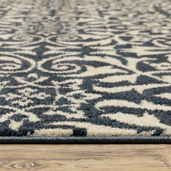 Homeroots 5' X 7' Blue And Ivory Floral Power Loom Stain Resistant Area Rug  Polyester 508812