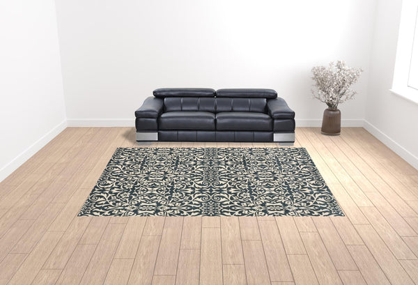 Homeroots 10' X 13' Blue And Ivory Floral Power Loom Stain Resistant Area Rug  Polyester 508815