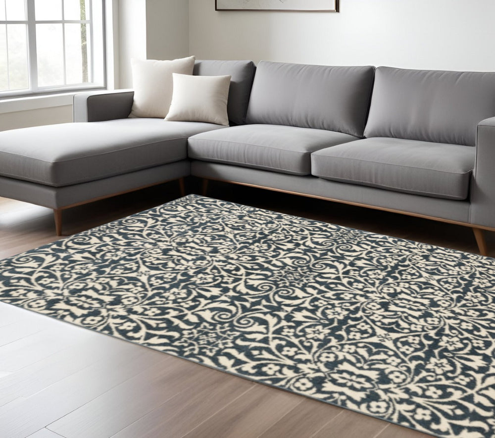 HomeRoots 10' Blue and Ivory Floral Power Loom Area Rug - Elegant, Stain-Resistant Design for Any Space 10' X 13' 508815