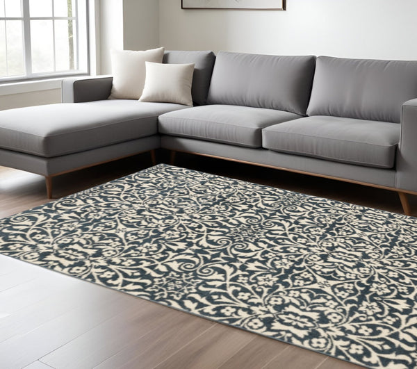 HomeRoots 10' Blue and Ivory Floral Power Loom Area Rug - Elegant, Stain-Resistant Design for Any Space 10' X 13' 508815