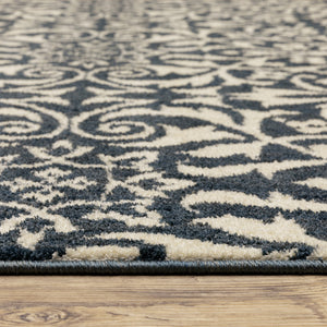 Homeroots 10' X 13' Blue And Ivory Floral Power Loom Stain Resistant Area Rug  Polyester 508815