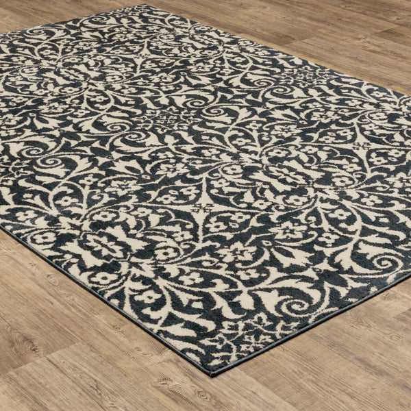 Homeroots 10' X 13' Blue And Ivory Floral Power Loom Stain Resistant Area Rug  Polyester 508815