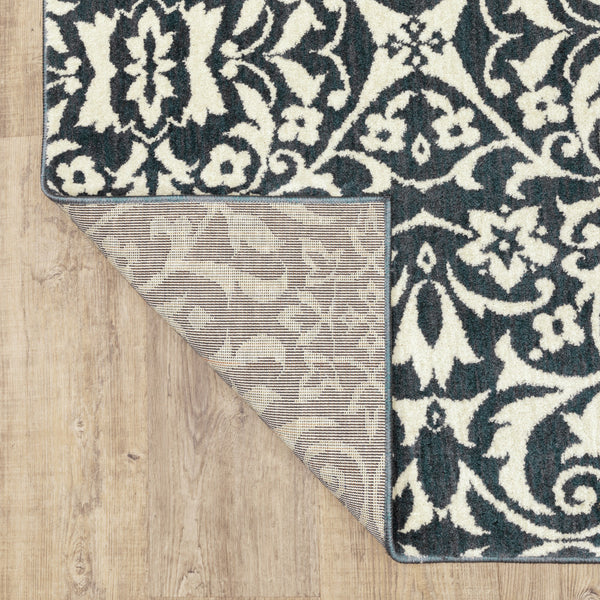 Homeroots 10' X 13' Blue And Ivory Floral Power Loom Stain Resistant Area Rug  Polyester 508815