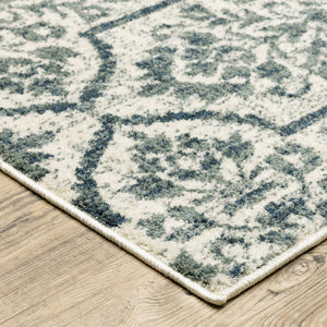 Homeroots 10' X 13' Ivory Blue And Sage Floral Power Loom Stain Resistant Area Rug  Polyester 508819