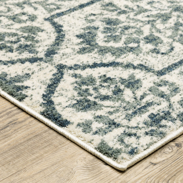 Homeroots 10' X 13' Ivory Blue And Sage Floral Power Loom Stain Resistant Area Rug  Polyester 508819