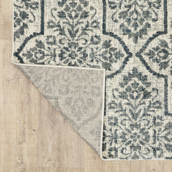 Homeroots 10' X 13' Ivory Blue And Sage Floral Power Loom Stain Resistant Area Rug  Polyester 508819