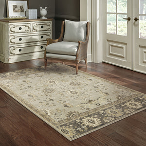 Homeroots 6' X 9' Grey Brown Tan And Beige Oriental Power Loom Stain Resistant Area Rug  Polypropylene 508848