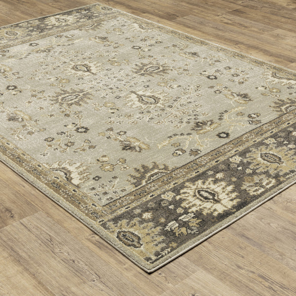 Homeroots 6' X 9' Grey Brown Tan And Beige Oriental Power Loom Stain Resistant Area Rug  Polypropylene 508848
