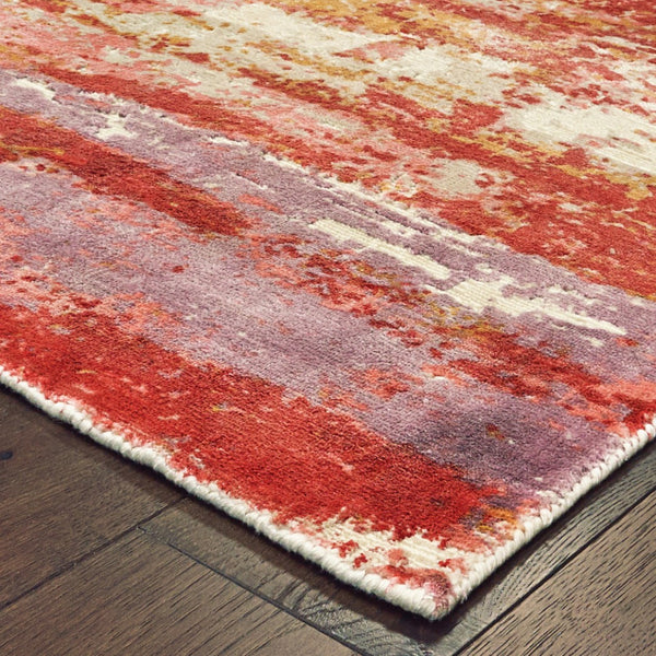 HomeRoots 10' Abstract Hand Loomed Area Rug in Pink and Red – Stain Resistant, Stylish, and Durable Design 6' X 9' 508878