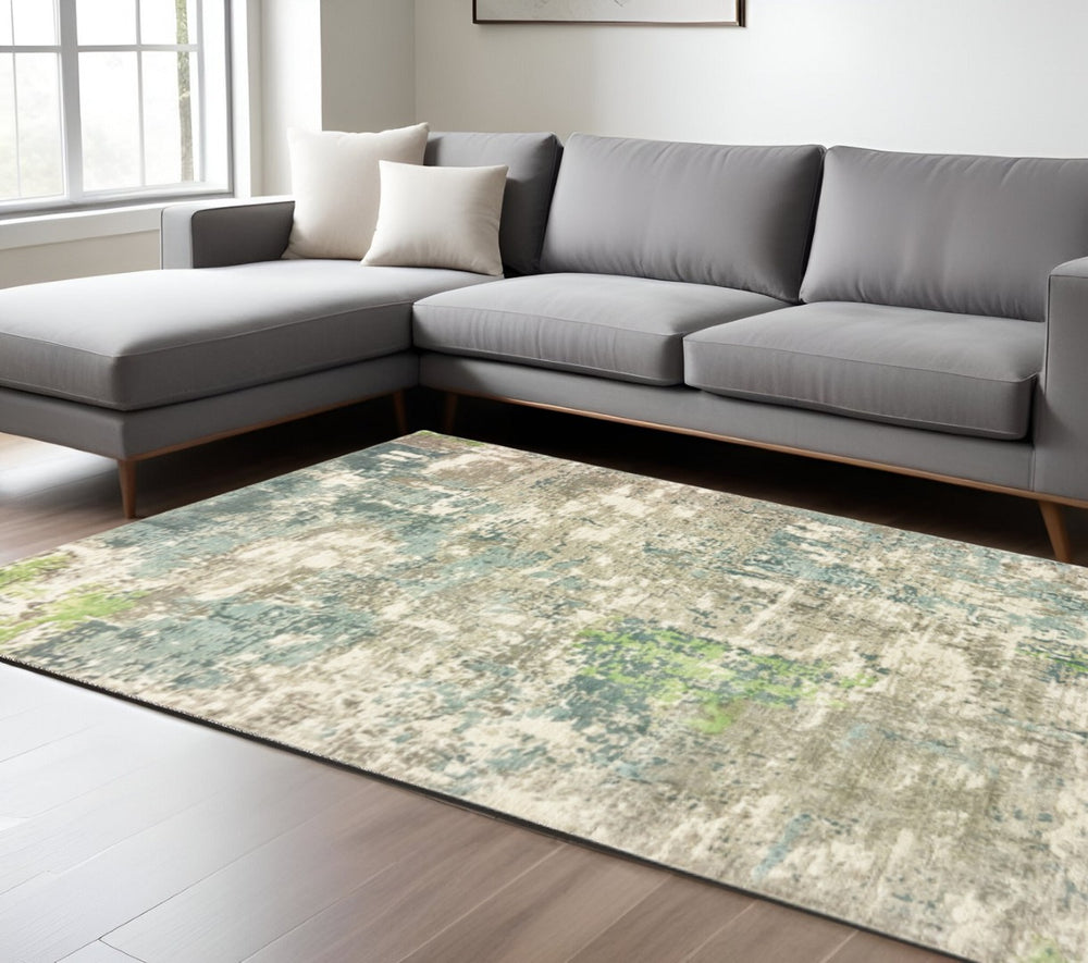 HomeRoots 10' Hand Loomed Blue and Green Abstract Area Rug - Stylish, Stain-Resistant Design for Modern Spaces 10' X 14' 508881