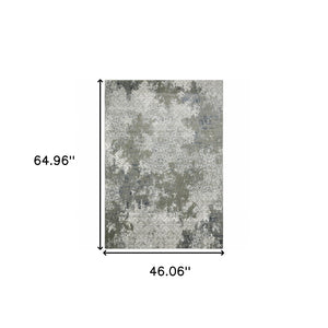 HomeRoots 2' Abstract Power Loom Runner Rug in Ivory, Grey, Blue & Taupe - Stain Resistant & Durable Design 4' X 6' 508893