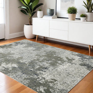 HomeRoots 2' Abstract Power Loom Runner Rug in Ivory, Grey, Blue & Taupe - Stain Resistant & Durable Design 4' X 6' 508893