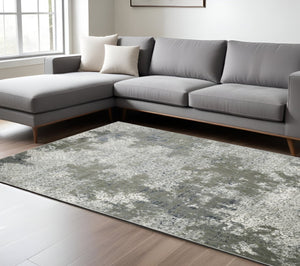 HomeRoots 2' Abstract Power Loom Runner Rug in Ivory, Grey, Blue & Taupe - Stain Resistant & Durable Design 8' X 11' 508896