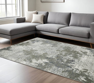 HomeRoots 2' Abstract Power Loom Runner Rug in Ivory, Grey, Blue & Taupe - Stain Resistant & Durable Design 10' X 13' 508897