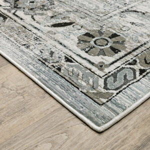 Homeroots 10' X 13' Ivory Grey Charcoal Blue And Taupe Oriental Power Loom Stain Resistant Area Rug  Polyester 508927