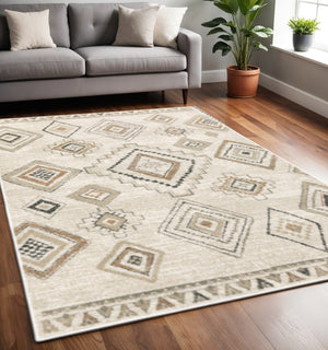 HomeRoots 5' Southwestern Area Rug in Ivory, Orange, Tan, Black & Grey - Durable, Stain-Resistant Design for Any Room 5' X 7' 508969