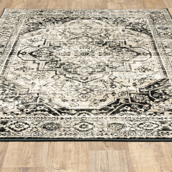 Homeroots 4' X 6' Black Grey Tan And Ivory Oriental Power Loom Stain Resistant Area Rug  Polypropylene 508974