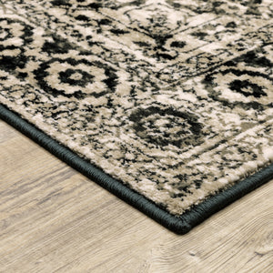 Homeroots 5' X 7' Black Grey Tan And Ivory Oriental Power Loom Stain Resistant Area Rug  Polypropylene 508975