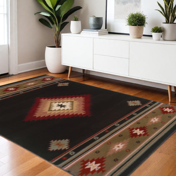 HomeRoots 4' Bold Southwestern Black and Green Power Loom Area Rug - Stain Resistant for High-Traffic Spaces 4' X 6' Rectangle 509034