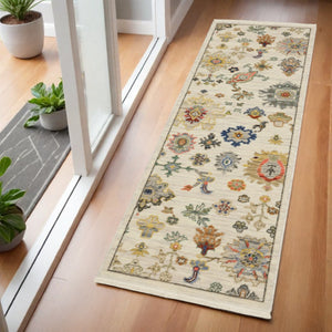 HomeRoots 2' Elegant Oriental Runner Rug with Vibrant Colors, Stain Resistance, and Classic Fringe Tassels Ivory/ Multi 2' x 6' 509325