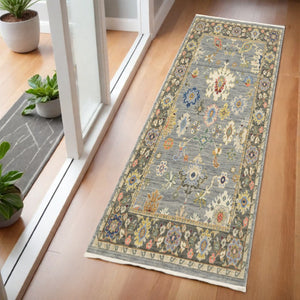 HomeRoots 6' Elegant Oriental Runner Rug in Blue, Ivory, and Red with Fringed Tassels for Hallways Blue/ Multi 2' x 6' 509346