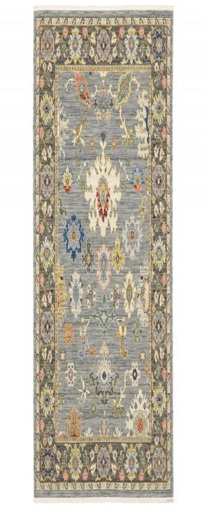 HomeRoots 6' Elegant Oriental Runner Rug in Blue, Ivory, and Red with Fringed Tassels for Hallways Blue/ Multi 2' x 6' 509346