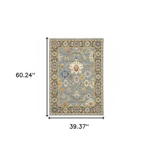 HomeRoots 6' Elegant Oriental Runner Rug in Blue, Ivory, and Red with Fringed Tassels for Hallways 3' x 5' 509347