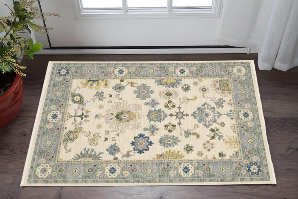 HomeRoots 6' Elegant Oriental Runner Rug in Blue, Ivory, and Red with Fringed Tassels for Hallways 3' x 5' 509354