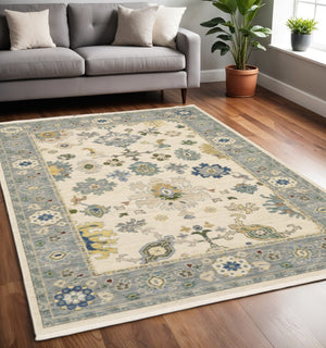 HomeRoots 6' Elegant Oriental Runner Rug in Blue, Ivory, and Red with Fringed Tassels for Hallways 5' X 8' 509355
