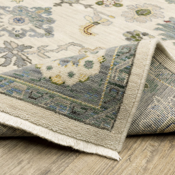 HomeRoots 6' Elegant Oriental Runner Rug in Blue, Ivory, and Red with Fringed Tassels for Hallways 5' X 8' 509355