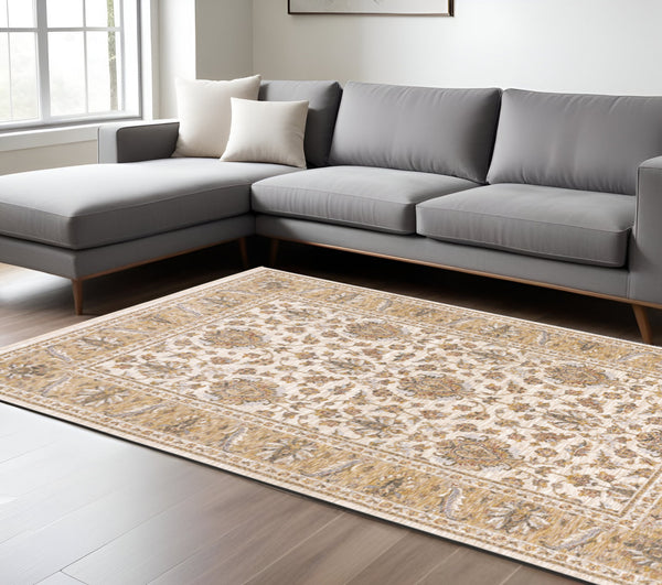 Homeroots 7' X 10' Gold And Ivory Oriental Power Loom Area Rug With Fringe Ivory,Gold Polyester 509418
