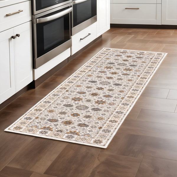 HomeRoots 2' Elegant Oriental Power Loom Runner Rug - Stain-Resistant, Stylish Fringe for High-Traffic Areas Ivory/ Gold 2'3" x 7'6" 509442