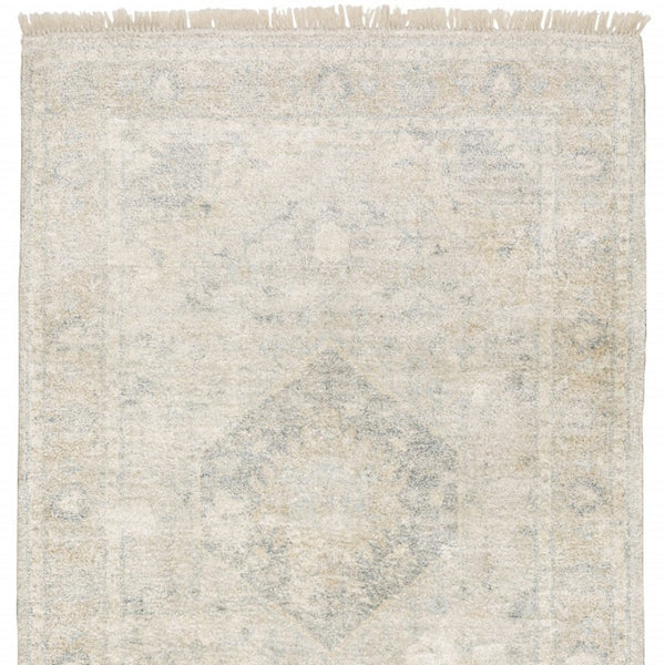 HomeRoots 10' Hand Loomed Beige and Gray Oriental Area Rug - Distressed Design with Fringe for Timeless Elegance 10' X 13' 509453