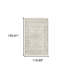 HomeRoots 10' Hand-Loomed Oriental Area Rug with Distressed Finish and Tasseled Fringe for Timeless Elegance 10' X 13' 509457