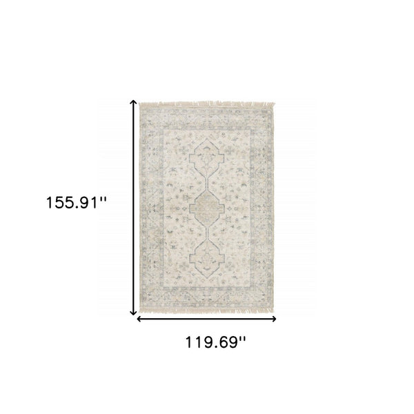 HomeRoots 10' Hand-Loomed Oriental Area Rug with Distressed Finish and Tasseled Fringe for Timeless Elegance 10' X 13' 509457