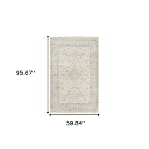 Homeroots 5' X 8' Beige And Charcoal Oriental Hand Loomed Stain Resistant Area Rug With Fringe Beige,Charcoal Polyester 509459
