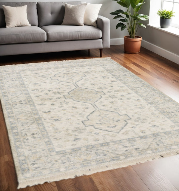 HomeRoots 10' Hand-Loomed Oriental Area Rug with Distressed Finish and Tasseled Fringe for Timeless Elegance 5' X 8' 509459