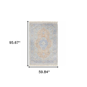 HomeRoots 10' Hand-Loomed Blue and Red Oriental Area Rug with Fringe - Durable, Stain-Resistant Design for Homes 5' X 8' 509467