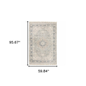 Homeroots 5' X 8' Beige And Grey Oriental Hand Loomed Stain Resistant Area Rug With Fringe  Polyester 509471