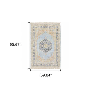 HomeRoots 10' Hand Loomed Blue and Beige Stain Resistant Area Rug with Fringe for Elegant Living Spaces 5' X 8' 509475