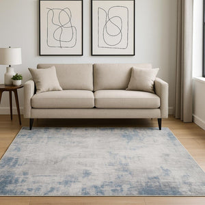 HomeRoots 5' Contemporary Grey and Blue Abstract Power Loom Area Rug - Stain Resistant, Ideal for High-Traffic Spaces 5' X 7' 509510