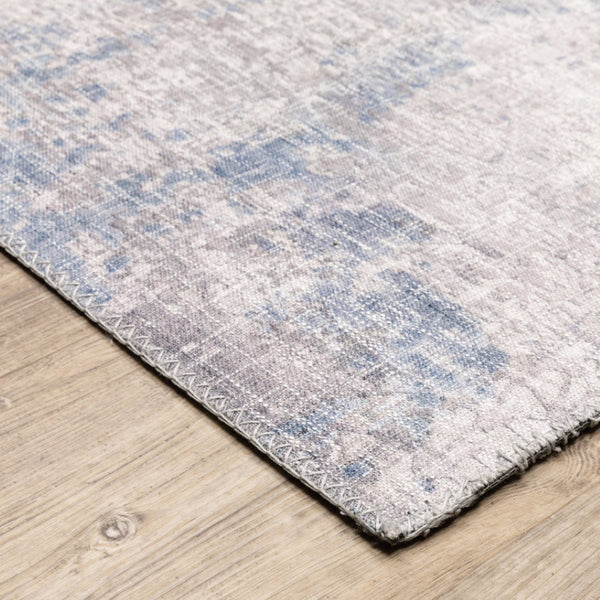 HomeRoots 5' Contemporary Grey and Blue Abstract Power Loom Area Rug - Stain Resistant, Ideal for High-Traffic Spaces 5' X 7' 509510