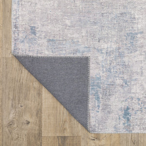 HomeRoots 5' Contemporary Grey and Blue Abstract Power Loom Area Rug - Stain Resistant, Ideal for High-Traffic Spaces 5' X 7' 509510