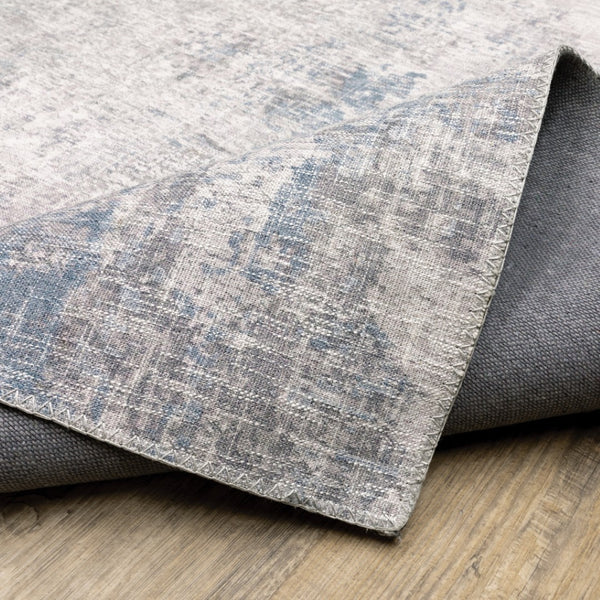 HomeRoots 5' Contemporary Grey and Blue Abstract Power Loom Area Rug - Stain Resistant, Ideal for High-Traffic Spaces 5' X 7' 509510
