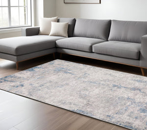 HomeRoots 5' Contemporary Grey and Blue Abstract Power Loom Area Rug - Stain Resistant, Ideal for High-Traffic Spaces 8' X 10' 509511