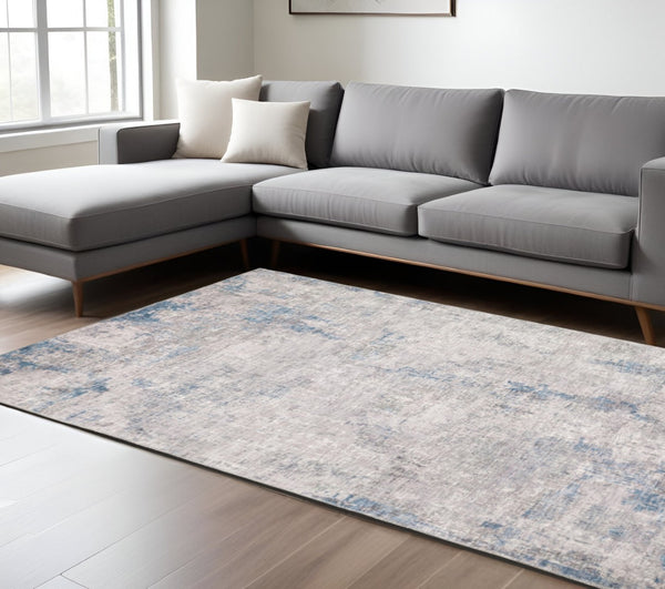 HomeRoots 5' Contemporary Grey and Blue Abstract Power Loom Area Rug - Stain Resistant, Ideal for High-Traffic Spaces 8' X 10' 509511